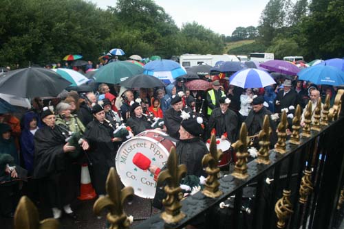 Millstreet Pipe Band attending the 2009 Commemoration Ceremony at Béal na mBláth where this year the weather was so very wet