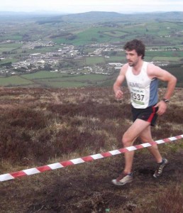 2012-04-15 Clara Mountain Run - Tim O'Donoghue - the eventual winner reaches the top of Clara before heading back down