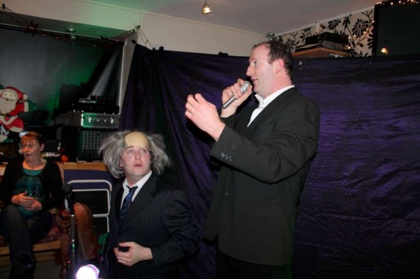 Diarmuid and Séamus Long of  "Madcaps" during one of their many send-ups of well known celebrities at the capacity filled Pub in Carriganima on Saturday night.   (S.R.)