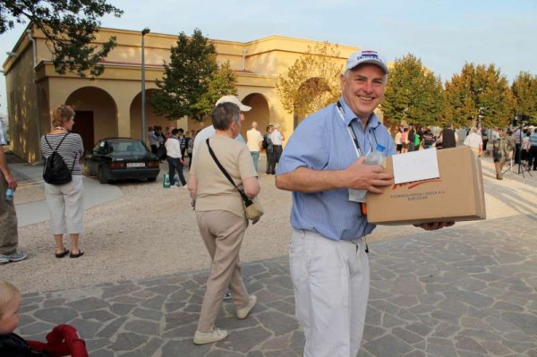 Pilgrimage Co-ordinator supreme, Tom Dennehy about to deliver the pilgrims' petitions at the Centre outside the town of Medjugorje where we were about to meet and listen to one of the most famous of the visionaries - Vicka.   (S.R.)
