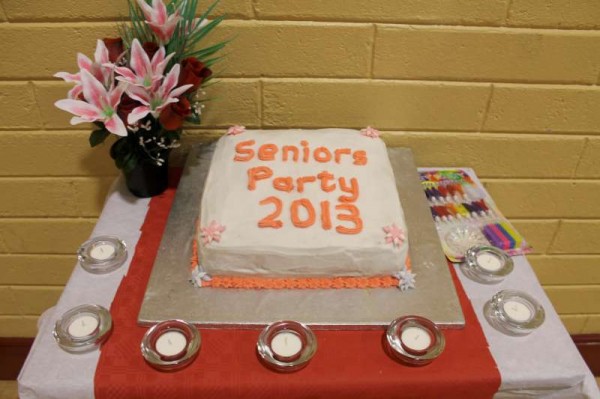 The annual Dromtariffe Seniors Party took place in Dromtariffe Community Centre on Sunday, 17th February 2013 beginning with the celebration of Mass by Fr. Comer during which the service of healing is also administered.   It is followed by the superbly organised three course delicious meal including a choice of drinks.   Here we view the beautiful cake baked by Mary Buckley for the wonderful occasion.   We now feature the first selection of images from the great event.   (S.R.)