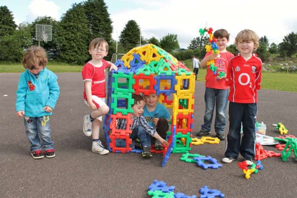 Hearing the school bell for the first time - some of the Junior Infant pupils who will be joining Cloghoula N.S. in September 2013 pictured here thoroughly enjoying their Open Day at the School on Tuesday, 18th June.  (S.R.)