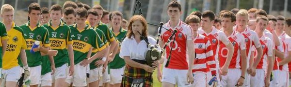 2013-07-17 Marie Twomey leads out the Cork and Kerry teams at the Final of the Humphery Kelleher Cup