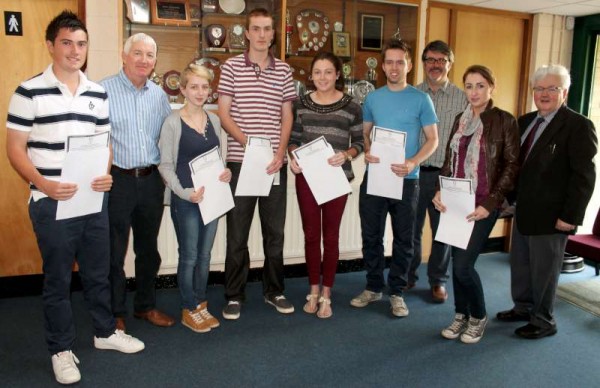 Receiving the results of Leaving Cert 2013 at Millstreet Community School on Wednesday morning.  Pictured (from left): Rory O'Connor, Derry Morley (Deputy Principal), Stacey Barrett, Mark O'Donovan, Eimear Twomey, Donal Linehan, John Magee (Chaplain/Teacher), Amy Sheahan and Pat Pigott (Principal).