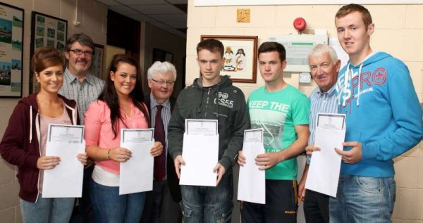 Receiving the results of Leaving Cert 2013 at Millstreet Community School on Wednesday morning. Pictured (from left):  Kayleigh Sheahan, John Magee (Chaplain/Teacher), Laura Dennehy, Pat Pigott (Principal), Stephen O'Regan, Len Murphy, Derry Morley (Deputy Principal) and Alan Murphy.