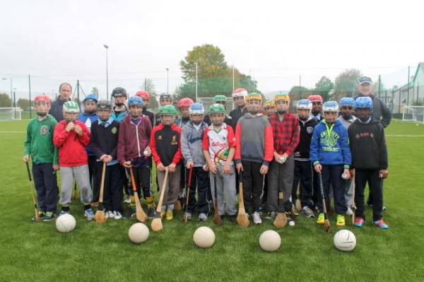 Pictured with Principal, Frank O'Connor (on left back) and Coach, Michael McCarthy - here we view some of the enthusiastic pupils of Scoil Mhuire, Millstreet B.N.S. playing on the ultra-modern Astro Turf Pitch which is situated near their National School.   Although it began to rain as we took our pictures today (24th Oct. 2013) it is clearly evident how very thrilled the young Students are with this marvellous new sporting amenity.   Click on the images to enlarge.  (S.R.)