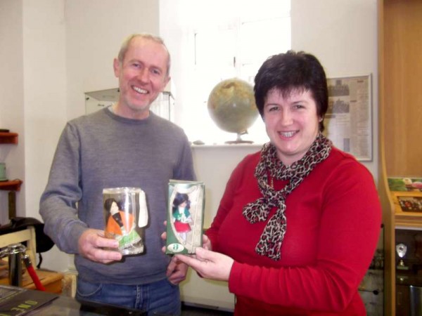 Thanks to Bob Emprimo from America and a wonderful Friend of Millstreet Museum - Celtic and Clara Toy Dolls were happily reunited at Millstreet Museum on Wednesday.   Here we view Denis O'Shea of the Millstreet Branch of Cork Co. Council with the Celtic Doll which he delivered from An Post and Mary Cronin of Millstreet Museum with the Clara Toy Doll.   Click on the images to enlarge.  (S.R.)