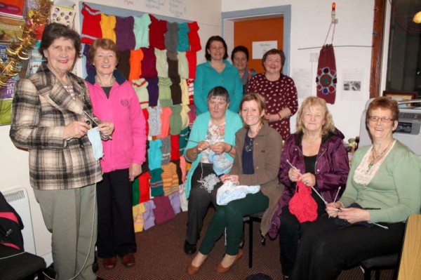 Coordinated by Áine (seated second from left) the Millstreet "Knit Together" Group (pictured) in association with Millstreet Active Retirement Group has just completed a superb project at their centre in Main Street, Millstreet where over the past number of weeks they have very creatively knitted several colourful "Fish and Chips" Jumpers for babies in Albania.   Sincere congratulations to All who have supported the "Heart to Hand" Foundation in such a very practical manner.   Many thanks to Breeda Cronin (standing on extreme right) for alerting us to this most inspiring work.   Click on the images to enlarge.  (S.R.)