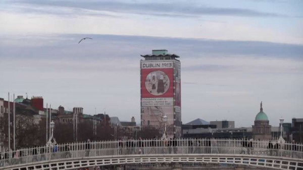 Liberty Hall in Dublin as it looked at the beginning of 2014 with the Halfpenny Bridge in foreground.  The Spire at night near the GPO and a glimpse of the Dolls' Museum in Powerscourt Shopping Centre.  Click on the images to enlarge.  (S.R.)