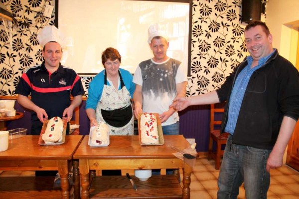 Seán Murphy of "The Pub", Carriganima on Friday, 28th Feb. 2014 introduces us to the the three gifted Pavlova Bakers - From left - Matthew Twomey, Dolly Ring ( Instructor supreme) and Kenneth Forde.   Among those who enjoyed the delicious fresh Pavlova Desserts were Eddie Walsh and Caroline Forde.  Click on the images to enlarge.  (S.R.)