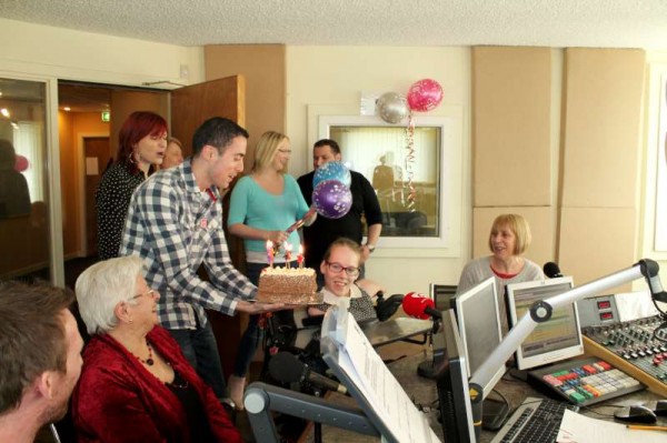 A surprise birthday cake delivered by John Paul of c103 during the live recording this morning on c103 with Patricia Messenger to mark the 18th Birthday of Joanne O'Riordan and the 81st Birthday of Eily Buckley.  Present for the interview were Anne and Steven O'Riordan, Joanne, Eily and Jerry O'Sullivan.  Click on the images to enlarge.  (S.R.)