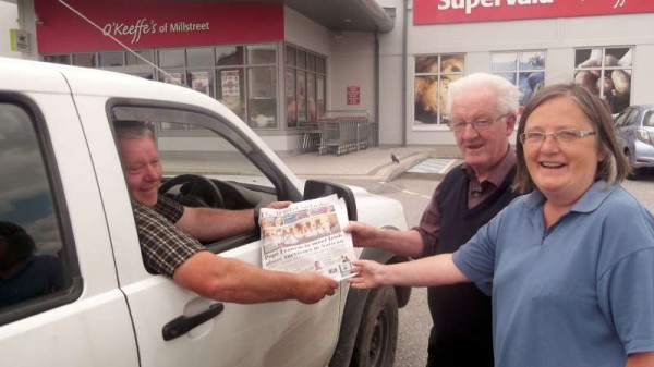 Gerard and Michele O'Callaghan with Brendan Murphy express their joy in viewing the front page coverage of Millstreet in "The Irish Catholic" on Saturday, 28th June 2014.