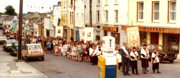 From our Millstreet Museum Archives - a picture taken from a similar angle of a Corpus Christi Procession of times past with the late Tom Gubbins in his role of CYMS Steward at the front of the Procession.