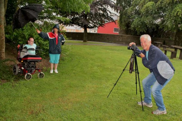 Tom Roche who travelled to Millstreet from Tullamore, Co. Offaly on Friday, 4th July to photograph Joanne O'Riordan at Joanne's Grove in Millstreet Town Park for the "Hug a Tree" Project 2014.   As you note from our feature it was quite a rainy morning but Tom captured great images and her mother, Anne, provided weather cover for the ever-witty and cheerful Joanne.  Later we shall have lots more information on this wonderfully creative annual project and will link to Tom's website.  Click on the images to enlarge.  (S.R.) 