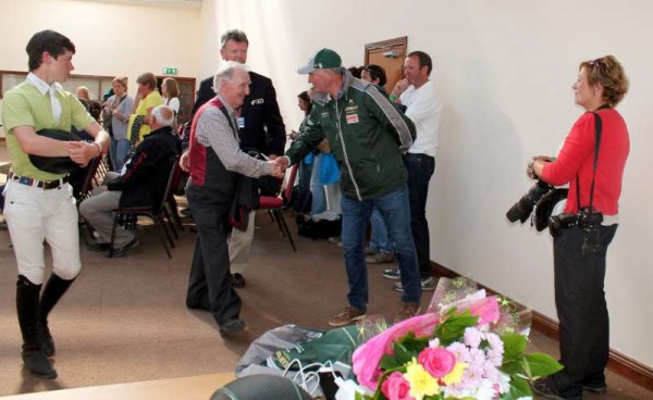 Noel C. is congratulated by Tom Slattery, Chef d'Equipe of the Irish Equestrian Team.  also included is Photographer supreme, Geraldine Dennehy who has worked with both in the world of equestrian sprort.