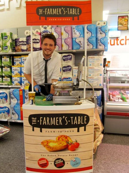 David Doherty representing the Auld Triangle Macroom - promoting the delicious Baked Potato Range at Supervalu, Millstreet this afternoon.  Click on the image to enlarge.  (S.R.)