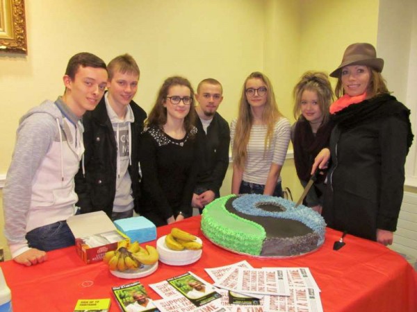 Kathryn McSweeney who with her Millstreet Community School Students superbly coordinated the creation of the delicious Fair Trade cake (notice the symbol of the person in a world of land and sea) all impressed the large attendance of the Fair Trade Fest at the Parish Centre on 28th February 2015.  Click on the images to enlarge.  (S.R.)