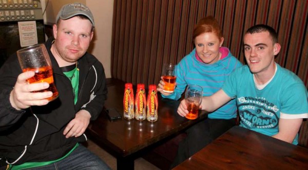 Michael Walsh celebrates his magnificent win with his Friends Jarleth & Lynn O'Sullivan.  It's a "Lucozade" celebration!