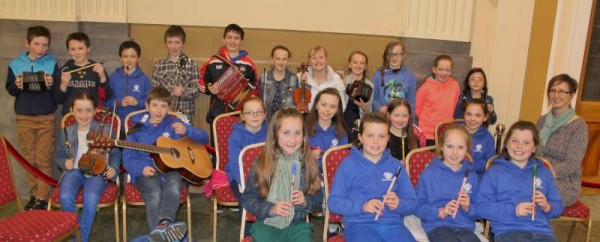 The wonderfully talented members of Millstreet CCÉ with their splendid Teacher, Mrs. O'Leary.  The congregation at the 7.30pm Mass on Monday warmly applauded the excellent presentation of traditional music by the Group.