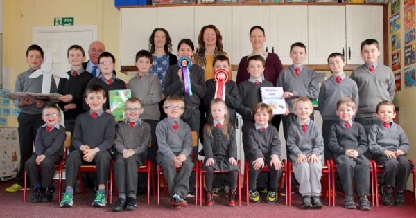 Sincere congratulations to the Senior Pupils of Cloghoula N.S. and to their Teacher, Ms. Joanne Murphy on having won the "Best Community Awareness Project" Award in the recent "Discover Cork Schools Heritage Project 2015".  They were presented with the wonderfully prestigious Award fpr their marvellously impressive Project by Cllr. Kieran McCarthy on Friday, 13th March 2015 in the Silversprings Hotel, Cork. It was indeed an honour to have been associated with the very interesting Project in the research stage of the overall uplifting endevour.   Pictured at Clogho