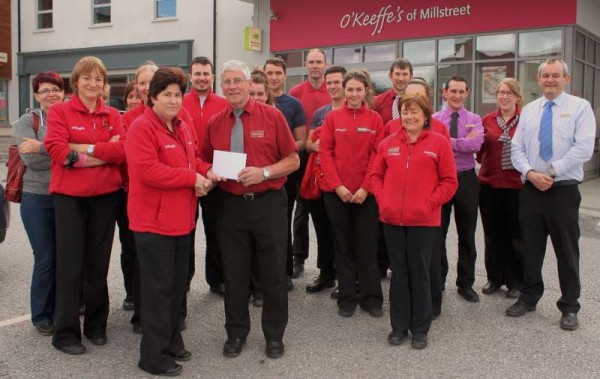 Suprememan Gentle and magnificent Sportsman Tommy Burke retired on Friday evening, 5th June 2015 after ten wonderfully dedicated years at O'Keeffe's Supervalu, Minor Row, Millstreet.  Presentations were made to the very popular work colleague by the Staff and Tommy was also asked to plant a special tree in his honour.   Click on  the images to enlarge.  (S.R.)