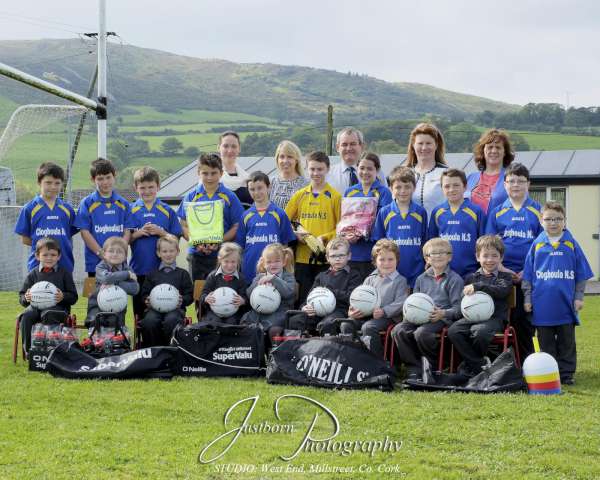 The pupils and staff of Cloghoula N.S. being presented with a variety of sports equipment including footballs, training ladders, bibs, cones, water bottles and gear-bags by Joe Fitzgerald of SuperValu, Millstreet on Monday, September 28th.