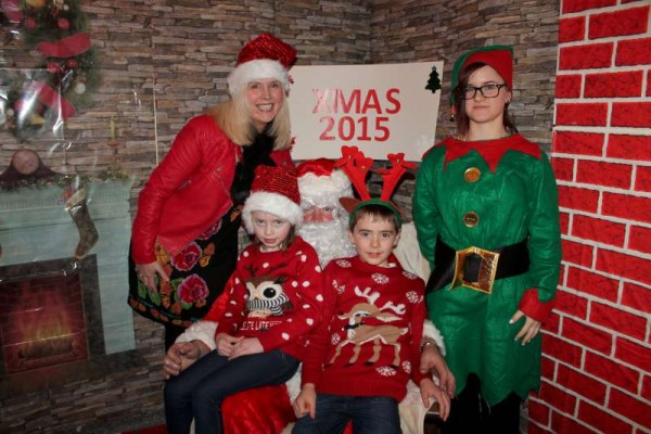 Santa received a royal welcome when he paid a visit to O'Keeffe's Supervalu in Millstreet on Friday evening. Above we join the Gilbourne Family and "Elf" Paulina