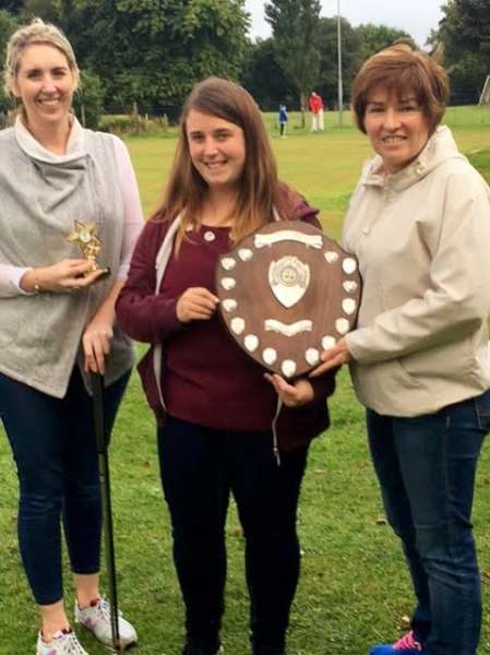 Paula O'Shea presenting the Paula O'Shea Shield to winner Deirdre Looney with Mairead Reen who was runner up.