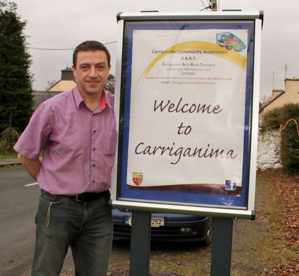Jerry O'Riordan of Carriganima pictured at the Welcome Sign in the Village.